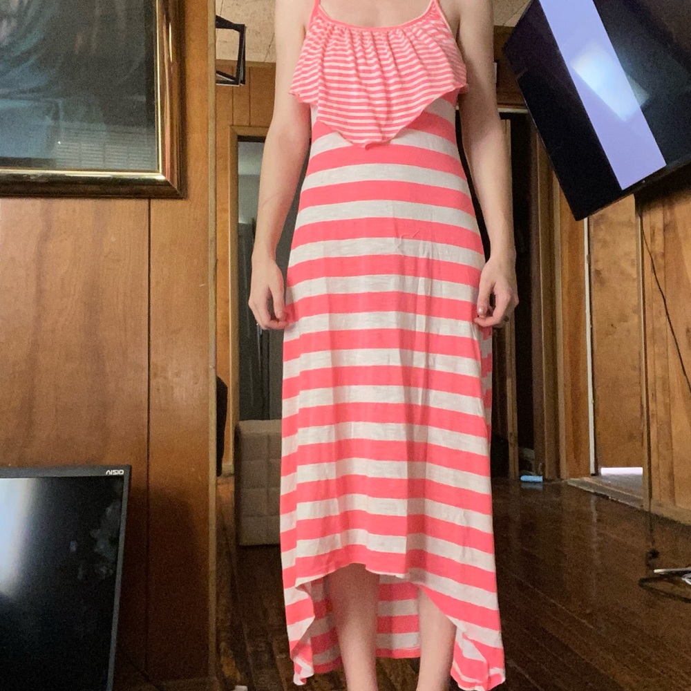 White and pink beach dress. Really thin.